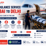 Air ambulance service from Mumbai to Delhi showing a critical care patient being transferred into a medically equipped aircraft by trained medical professionals.