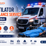 Ventilator ambulance service in Mumbai showing a critical care patient on a stretcher, advanced ventilator support, cardiac monitoring equipment, and a fully equipped ambulance.